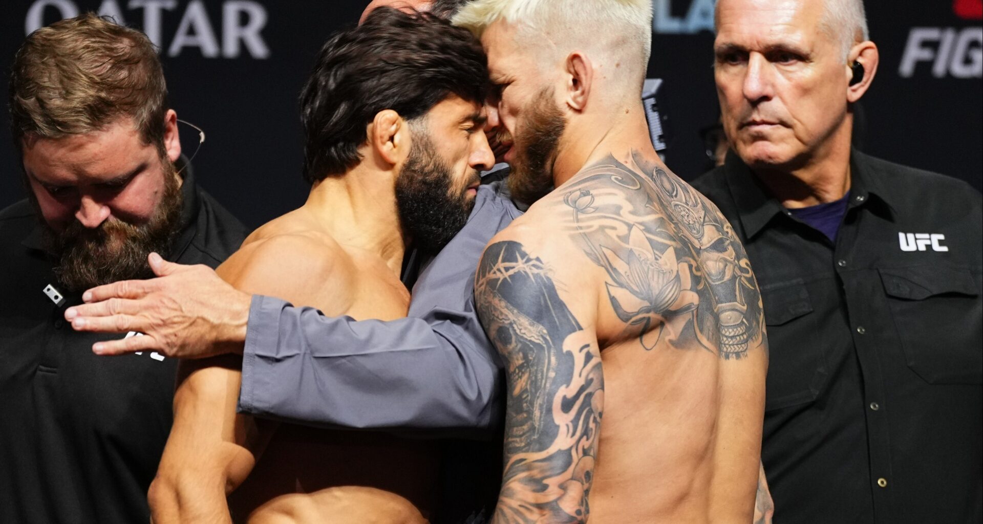 Arman Tsarukyan headbutts Dan Hooker during the UFC Qatar ceremonial weigh-in