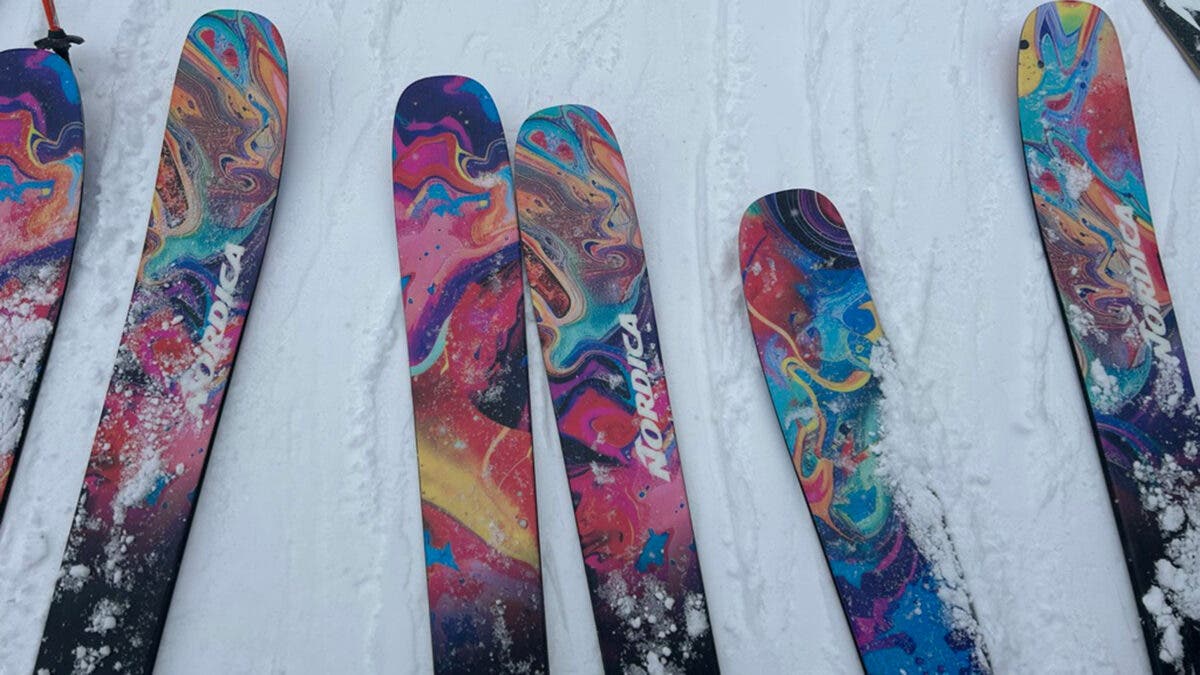 Closeup of 2027 Nordica Unleashed ski tips on snow