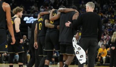 Golden Warriors star Jimmy Butler goes down with right knee injury in win over Miami Heat