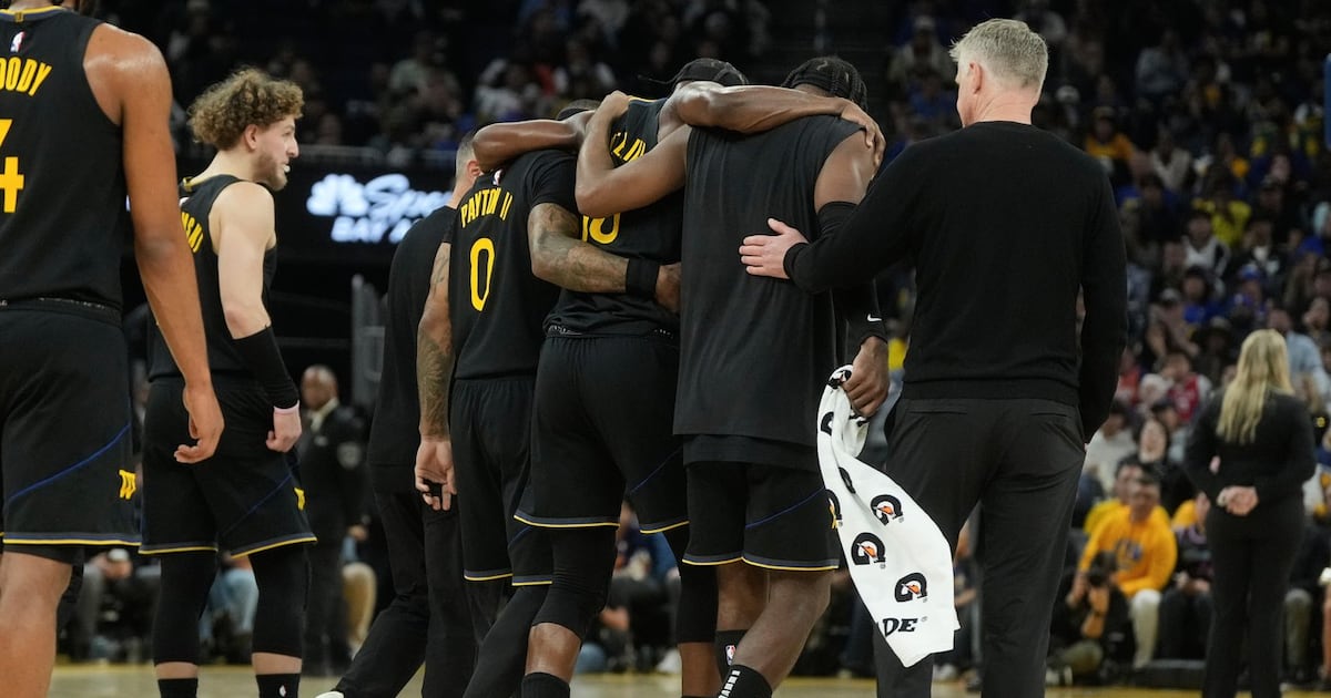 Golden Warriors star Jimmy Butler goes down with right knee injury in win over Miami Heat