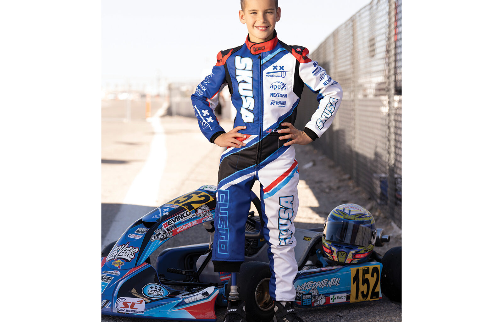 Pedro Cueto in front of his race car