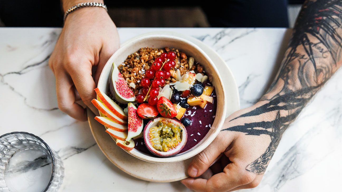 A bowl full of fruits and nuts