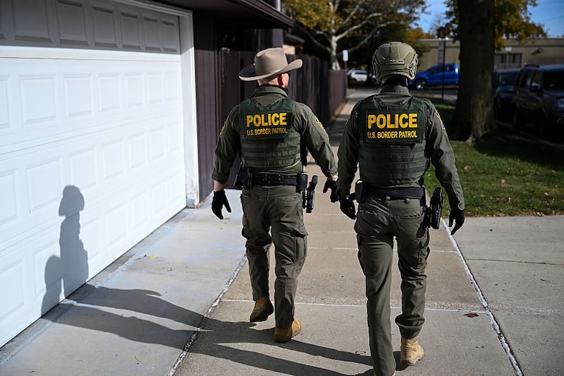 Border Patrol arrests search a neighborhood for an individual they were chasing on November 6, 2025 in Chicago