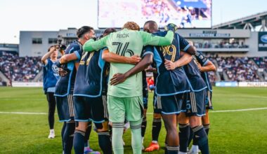 Goalkeeper Andrew Rick (center) in the pregame huddle with teammates before the Union's MLS match against the Chicago Fire at Subaru Park earlier this summer.