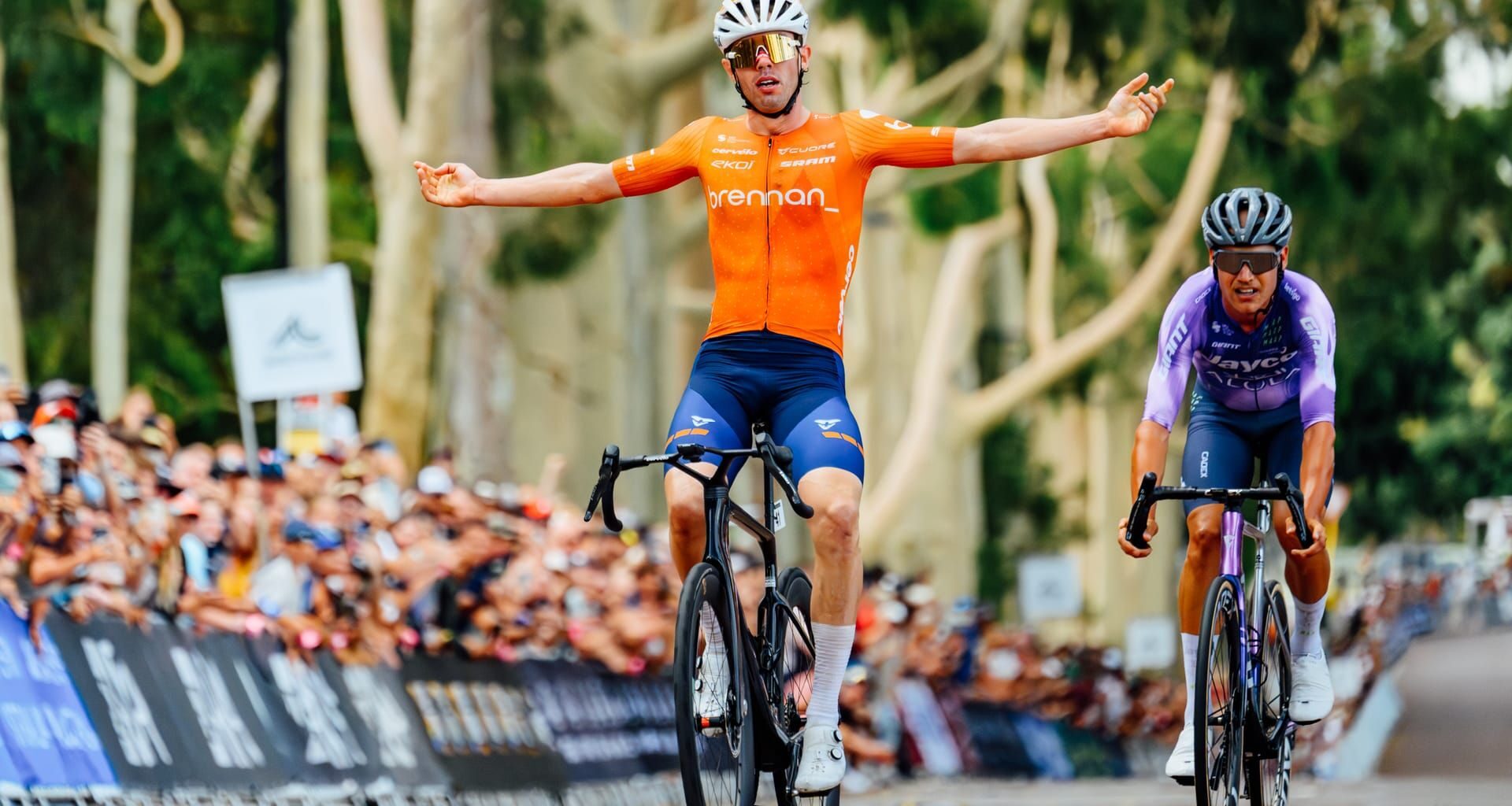 Patrick Eddy celebrating his Australian national title win ahead of Luke Plapp