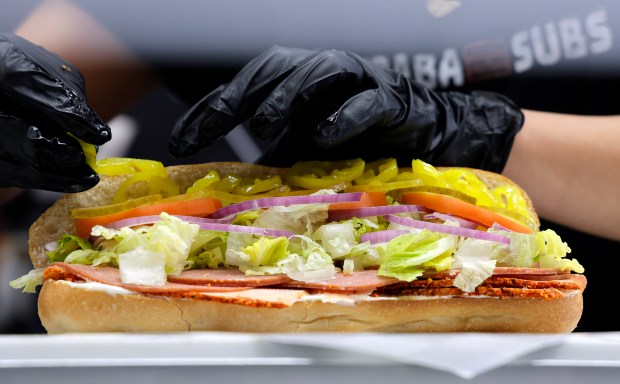 Manager Michal Hezi makes a Mexican salami sub sandwich at Subaba Subs in Dania Beach on Thursday, Jan. 22, 2026. (Amy Beth Bennett / South Florida Sun Sentinel)