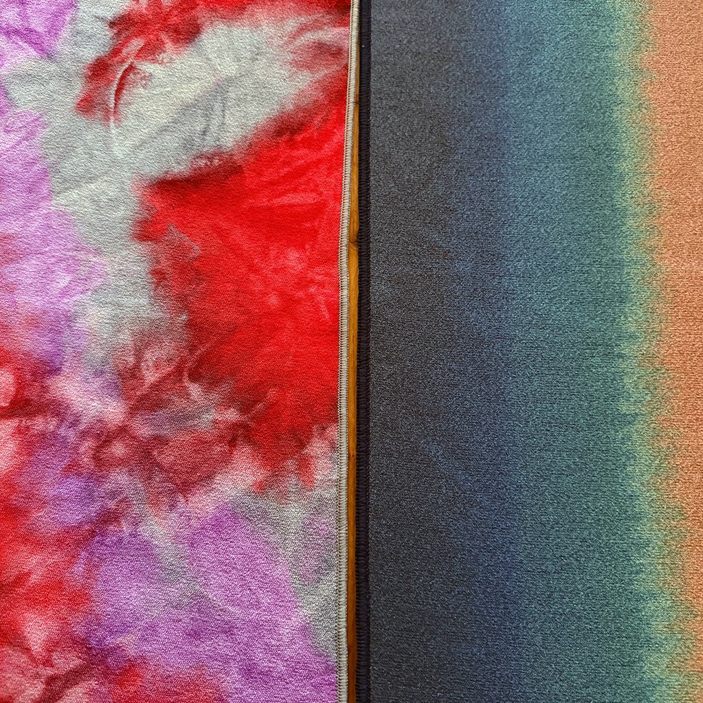 Two yoga mat towels side by side and on display.