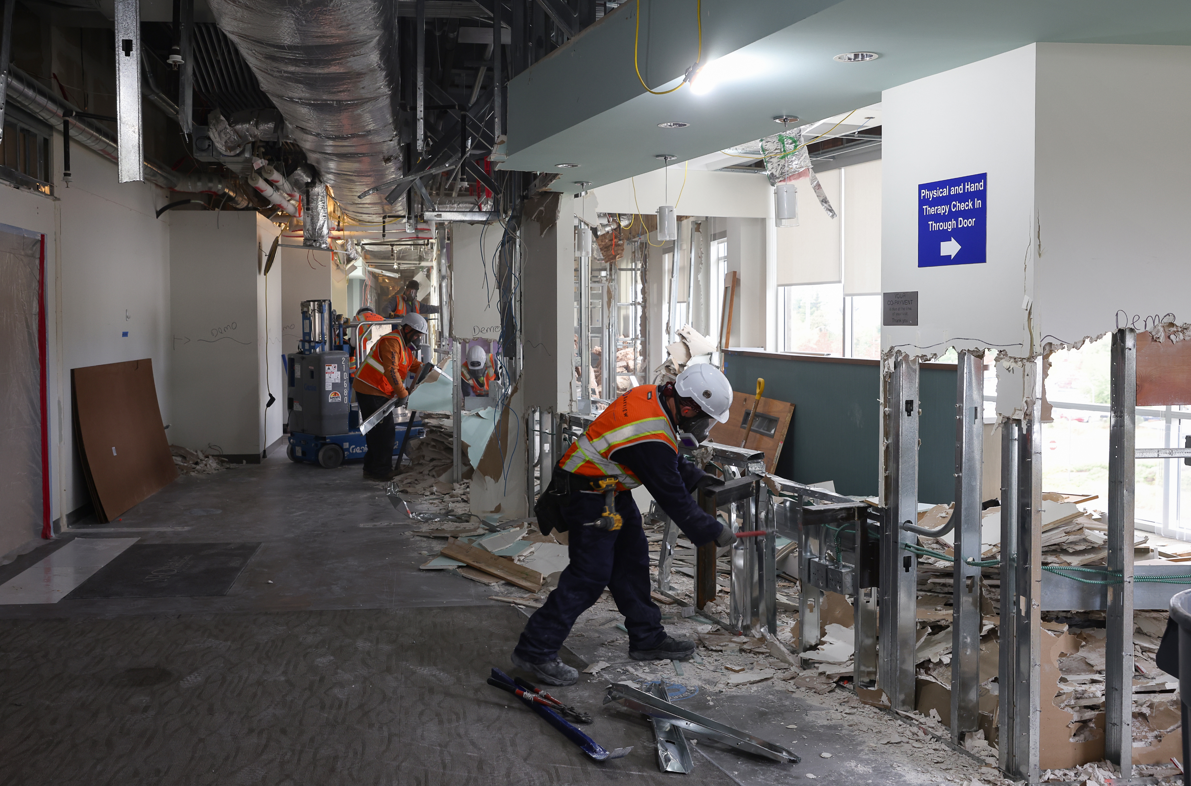 Construction workers demolish a non-Sutter occupied private practice facility on...