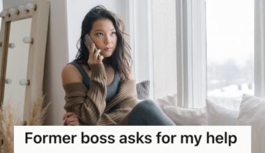 Woman smirking while talking on the phone