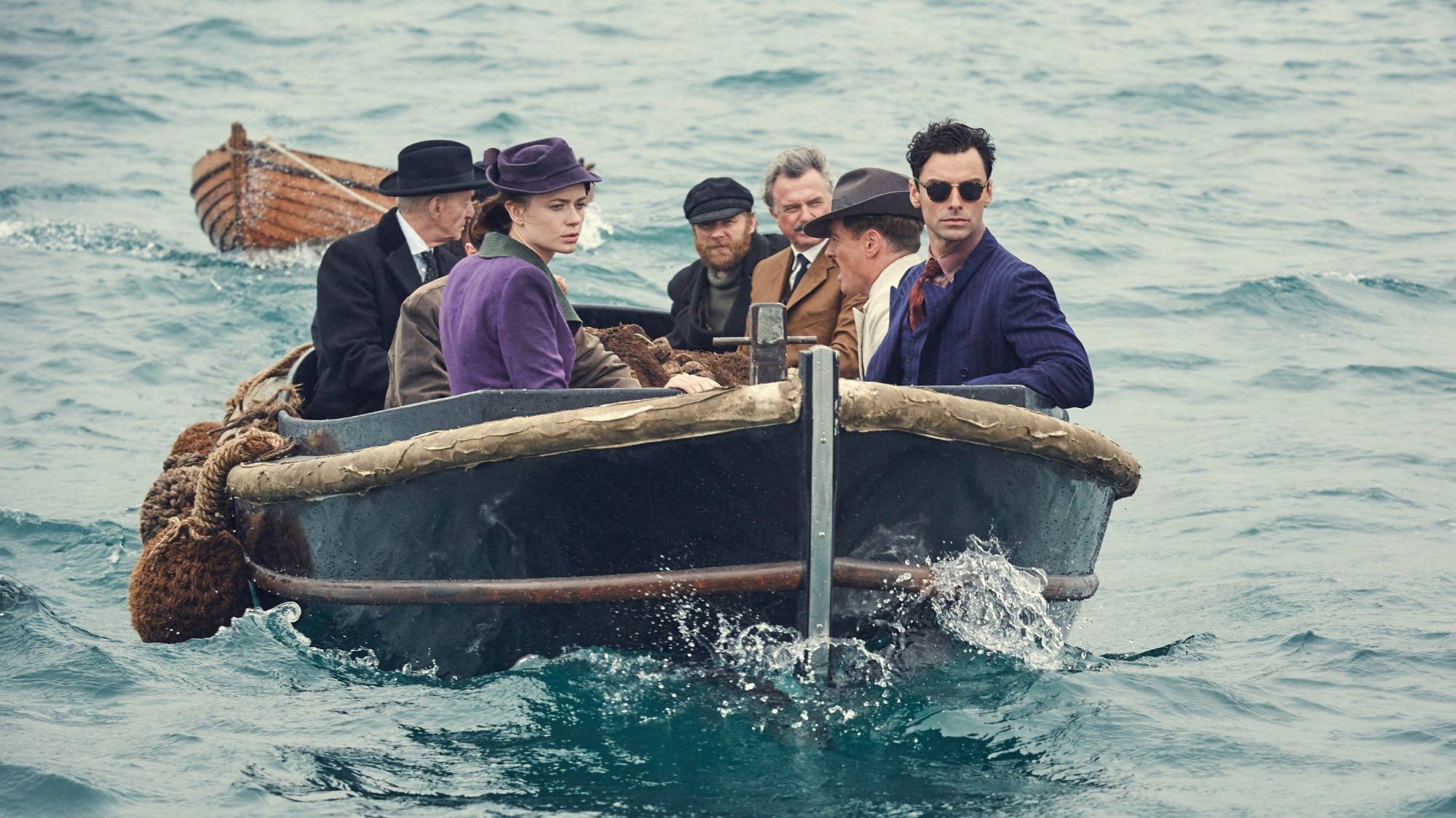 The main cast of "And Then There Were None" in a boat