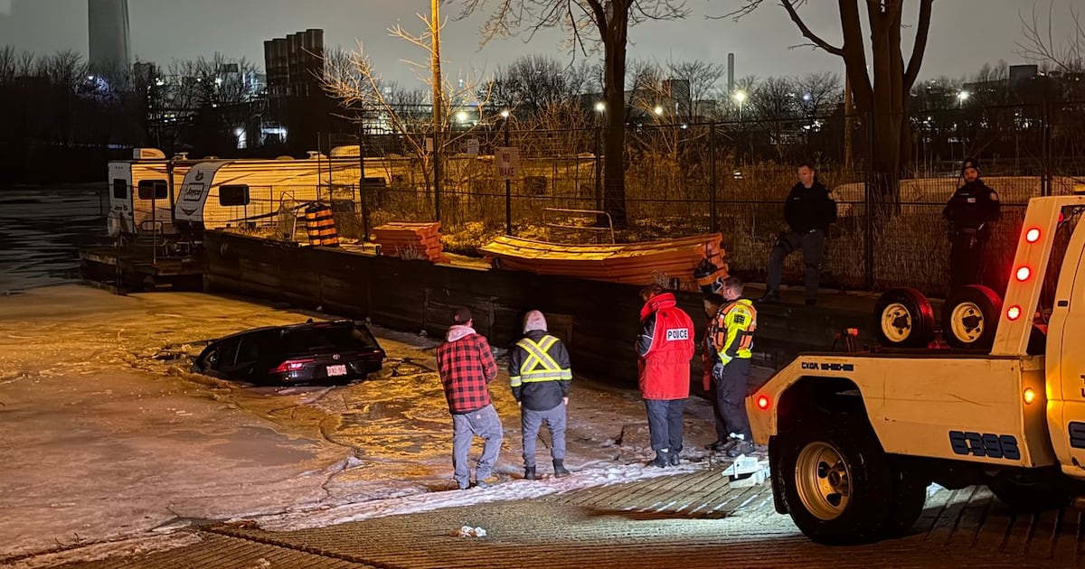 Vehicle slides into water in Mimico