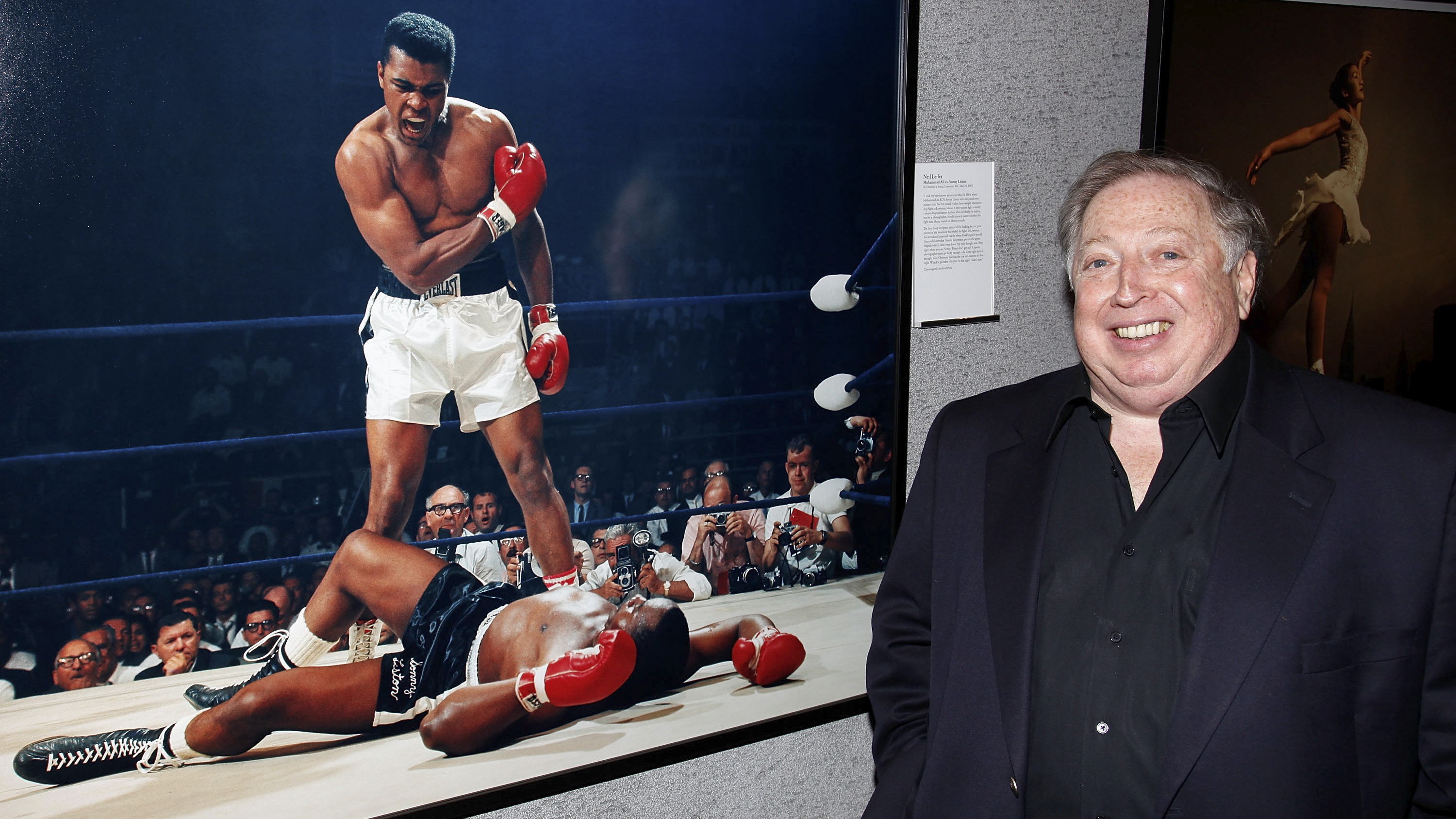 Photographer Neil Leifer poses next to his photography at "Sport: Iooss and Leifer" Exhibit Opening at The Annenberg Space For Photography on November 13, 2009 in Century City, California. (Photo by Brian To/FilmMagic)