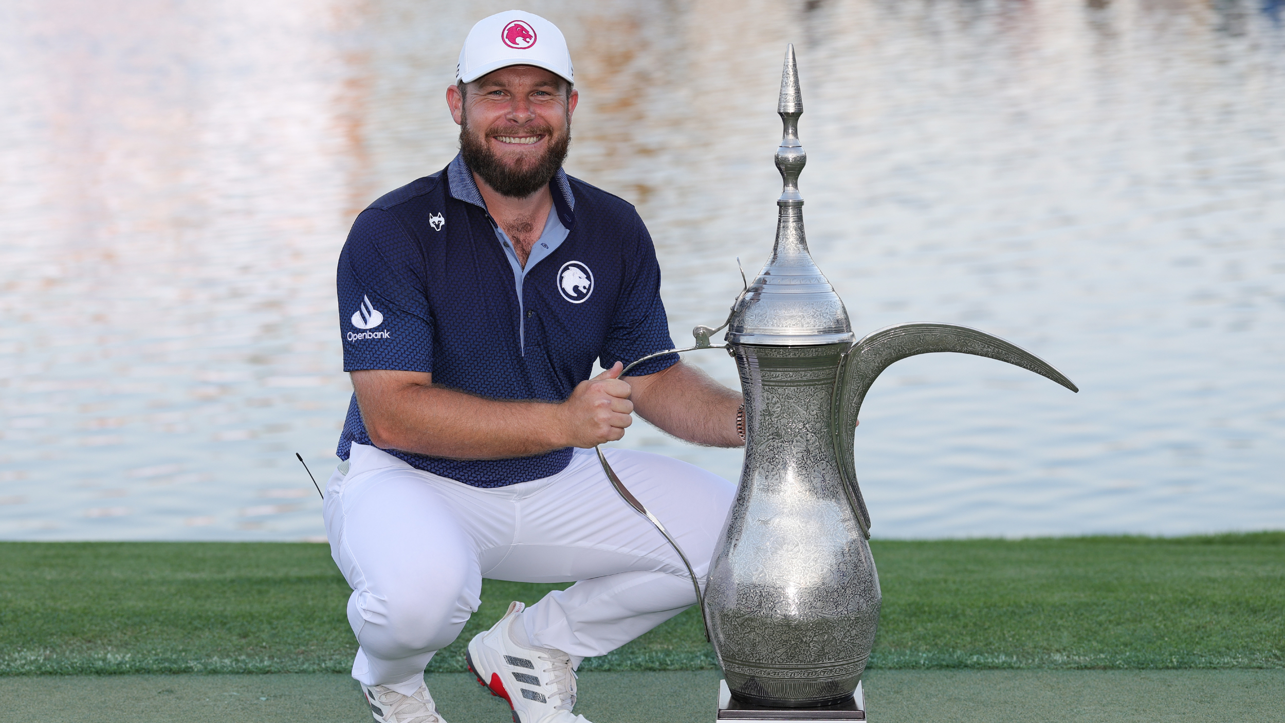 Tyrrell Hatton with the Dubai Desert Classic trophy