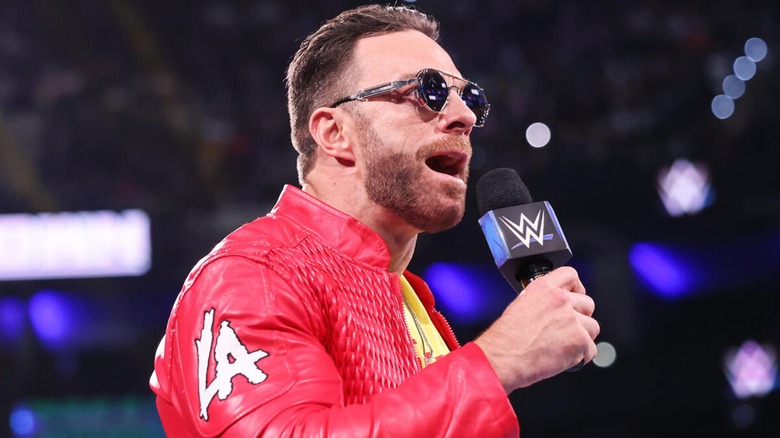 LA Knight cutting a promo during a WWE show.