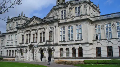 Colin Smith/Geograph The outside of the main Cardiff University building with a pathway leading up to the entrance seen at the bottom.