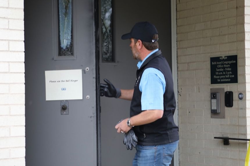 Zach Shemper, president of Beth Israel Congregation, enters the synagogue hours after a fire damaged it on Saturday, January 10, 2026, in Jackson, Mississippi.