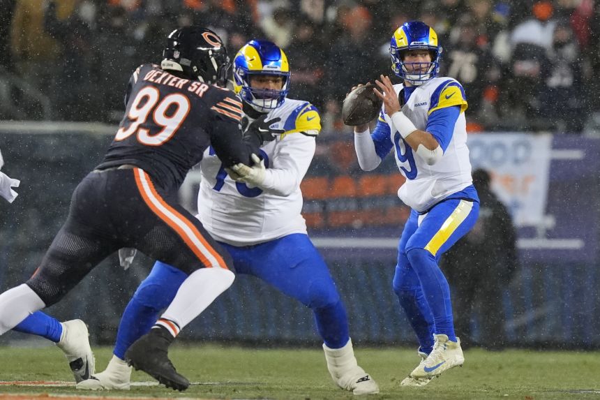 Los Angeles Rams quarterback Matthew Stafford looks to pass during the playoff win against the Chicago Bears on Sunday.