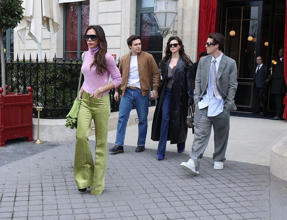 Victoria Beckham and her sons Brooklyn and Cruz seen in Paris during the Fashion Week