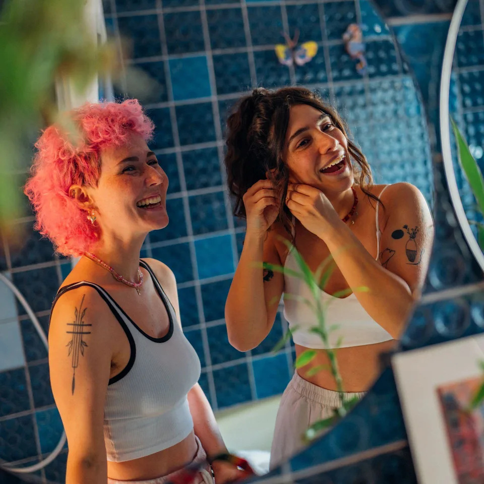 Young women chatting and getting ready