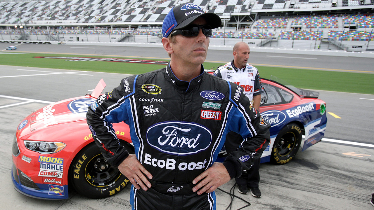 Greg Biffle looks up at the scoring monitor after he qualified for Saturday night's NASCAR Sprint Cup race at Daytona International Speedway, Friday, July 1, 2016, in Daytona Beach, Fla. (John Raoux/AP)