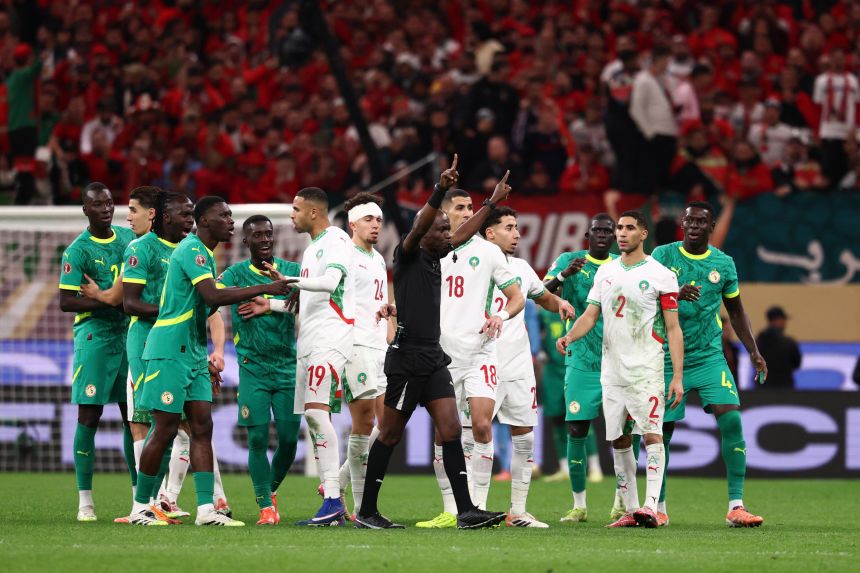 Senegal players walked off the field after Morocco was awarded an controversial stoppage-time penalty.