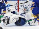Vancouver Canucks goaltender Thatcher Demko looks for the puck in traffic during the first period against the Buffalo Sabres on Jan. 6, 2026, in Buffalo, N.Y. 