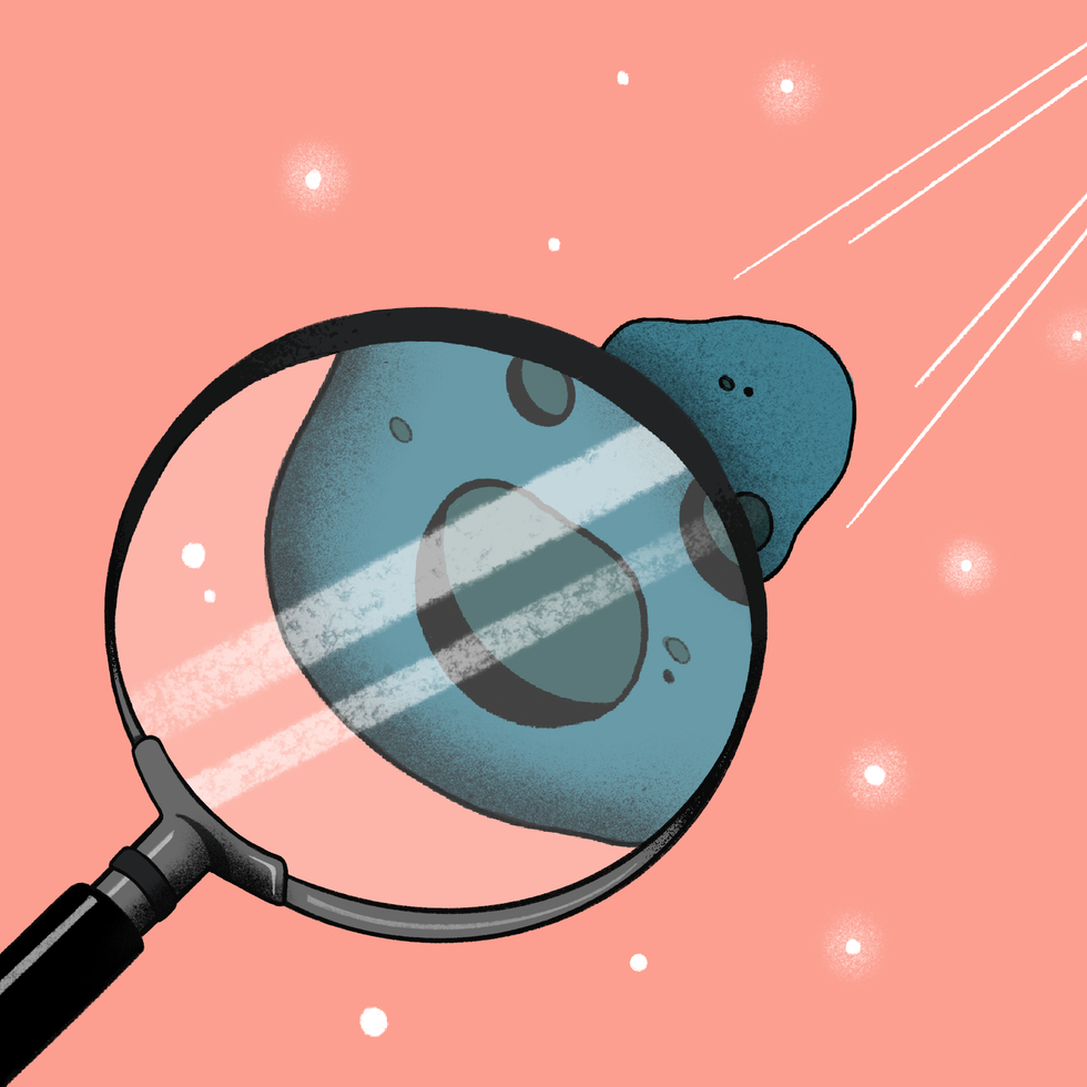 Cartoon of a magnifying glass showing an asteroid speeding toward the viewer.