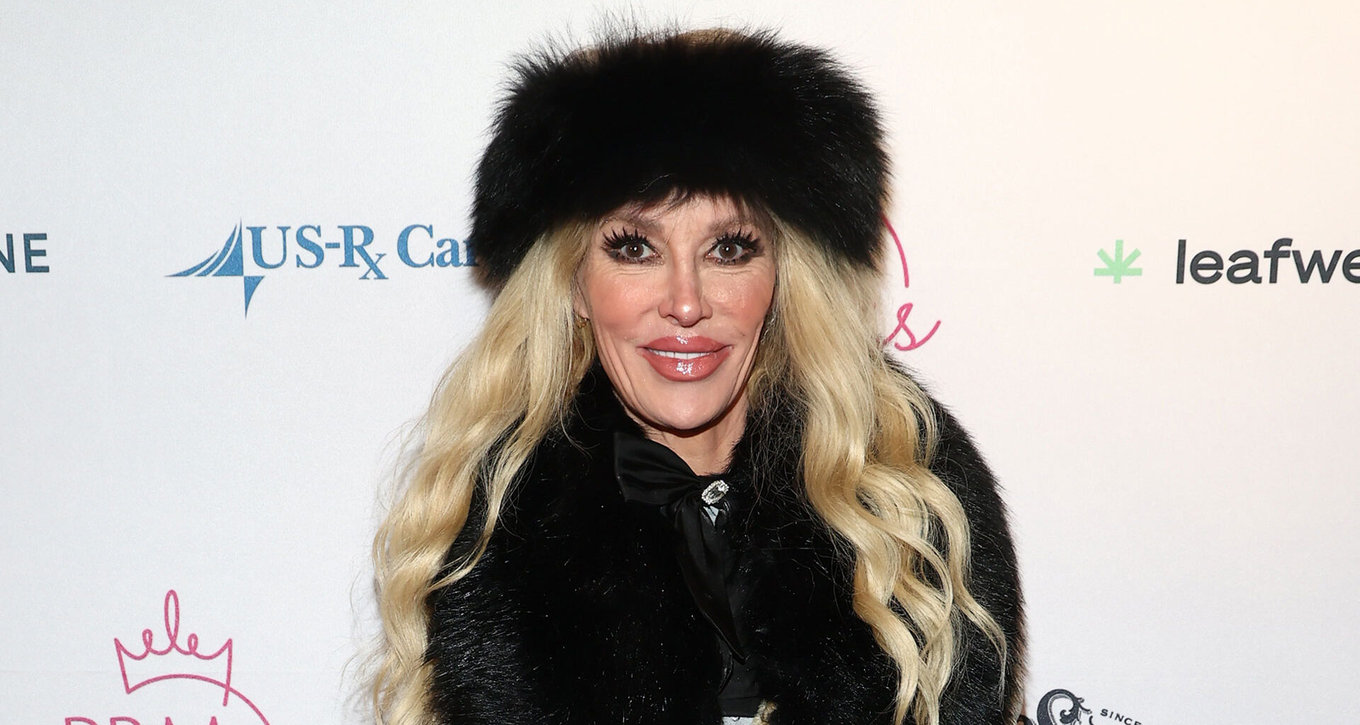 RHOBH's Brandi Glanville makes rare red carpet appearance after she claims a parasite disfigured her face