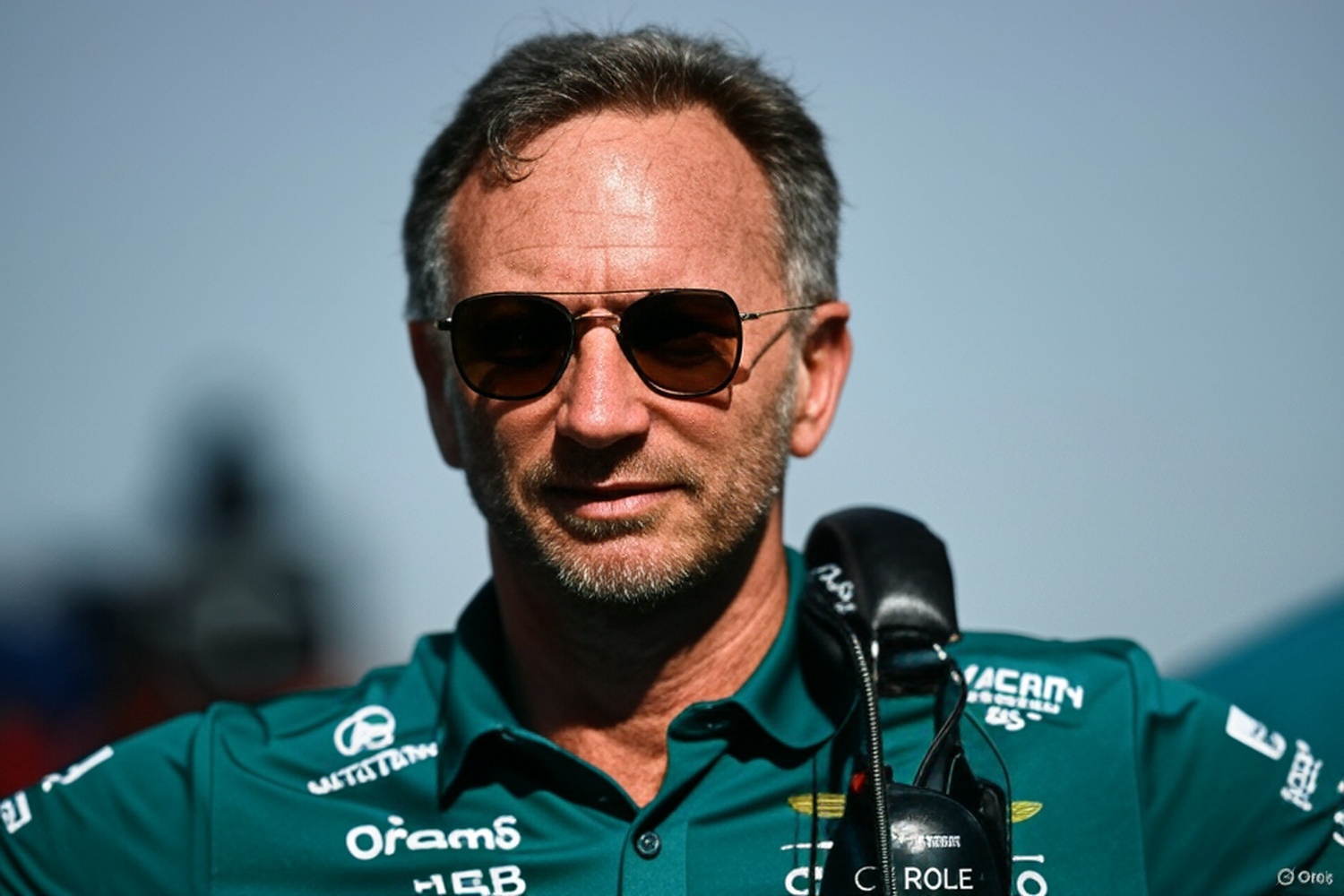 Christian Horner in Aston Martin F1 attire. Image is AI generated