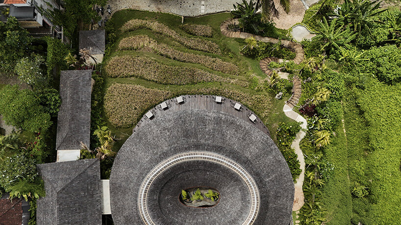 circular bamboo roof collects rainwater at balinese restaurant by pablo luna studio