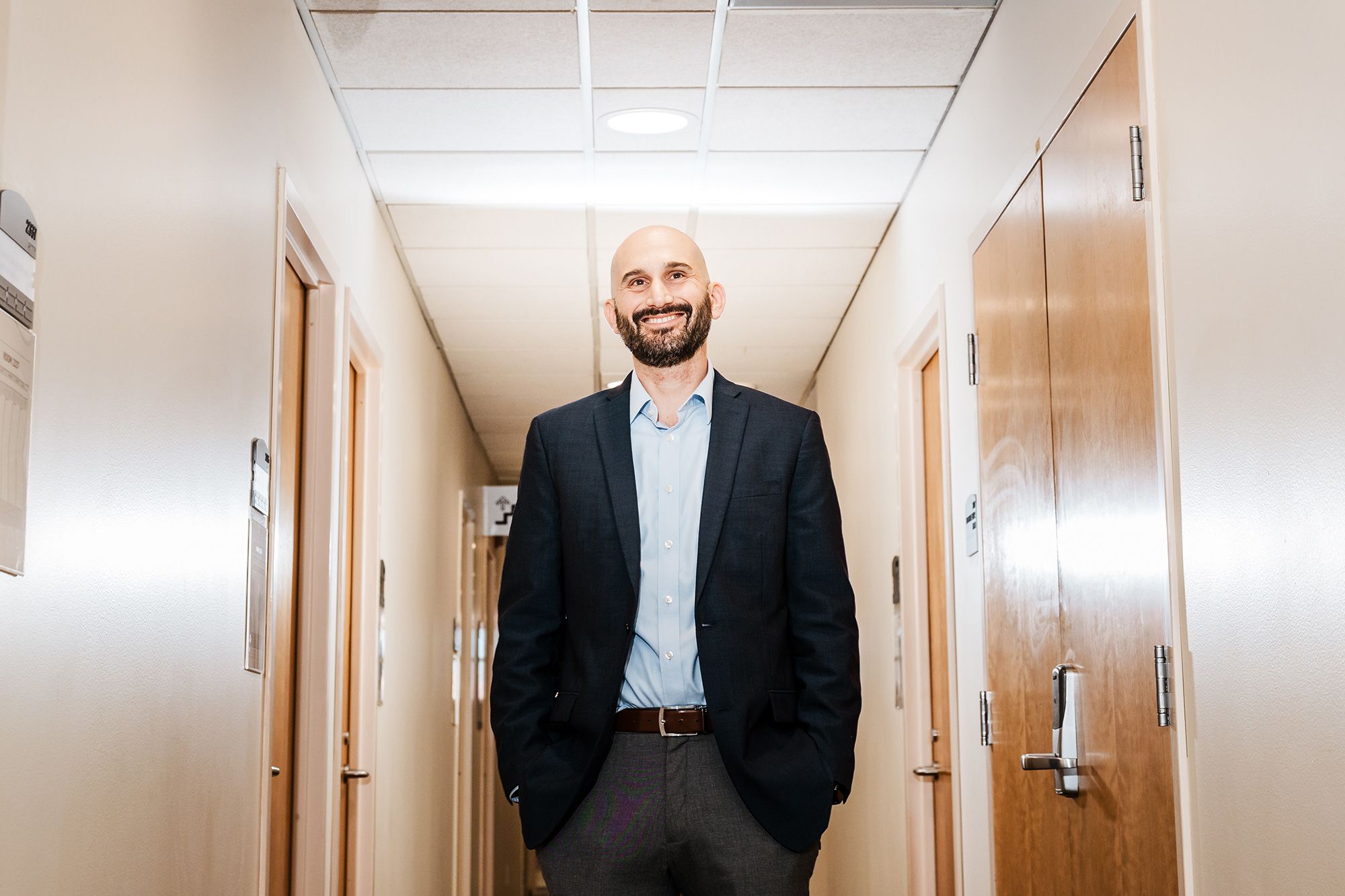Dr. Ian Kratter stands in the hallway at the Stanford...