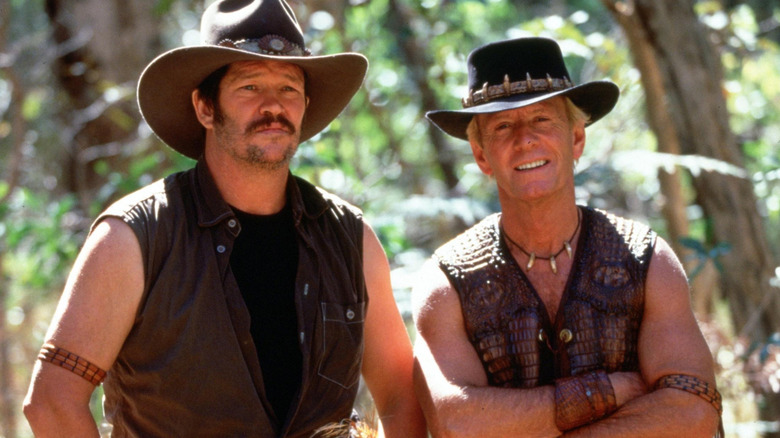 Crocodile Dundee crossing arms next to Jacko in Crocodile Dundee in Los Angeles (2001)