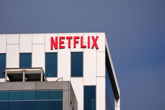 A Netflix sign is displayed atop a building in Los Angeles on Wednesday, Dec. 17, 2025. (AP Photo/Jae C. Hong)