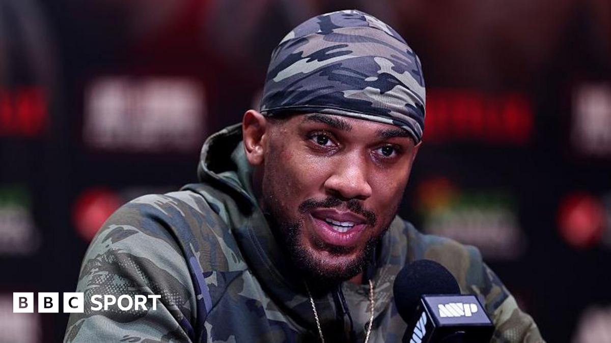 Anthony Joshua speaking during a news conference before his fight against Jake Paul