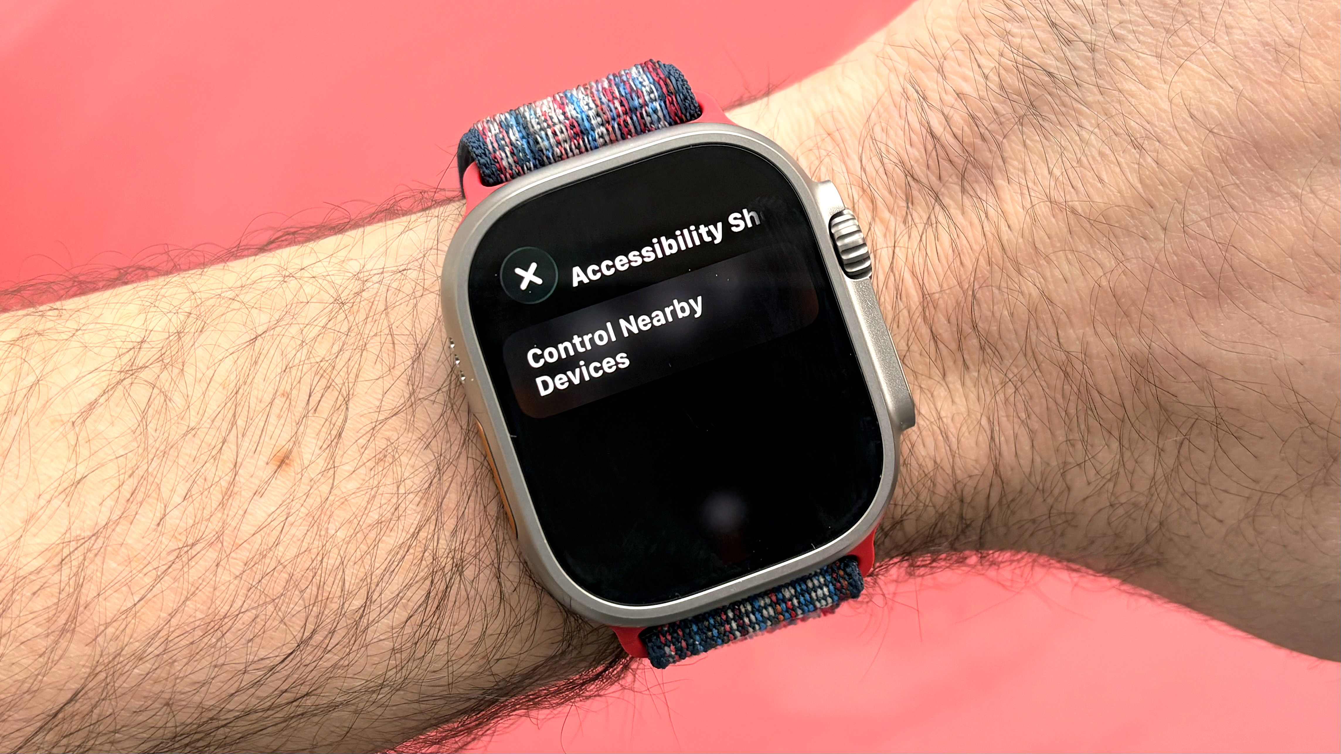Apple Watch Ultra 3 close-up showing the control nearby devices feature