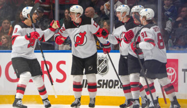 Glass has 3 points, Devils hold off Canucks