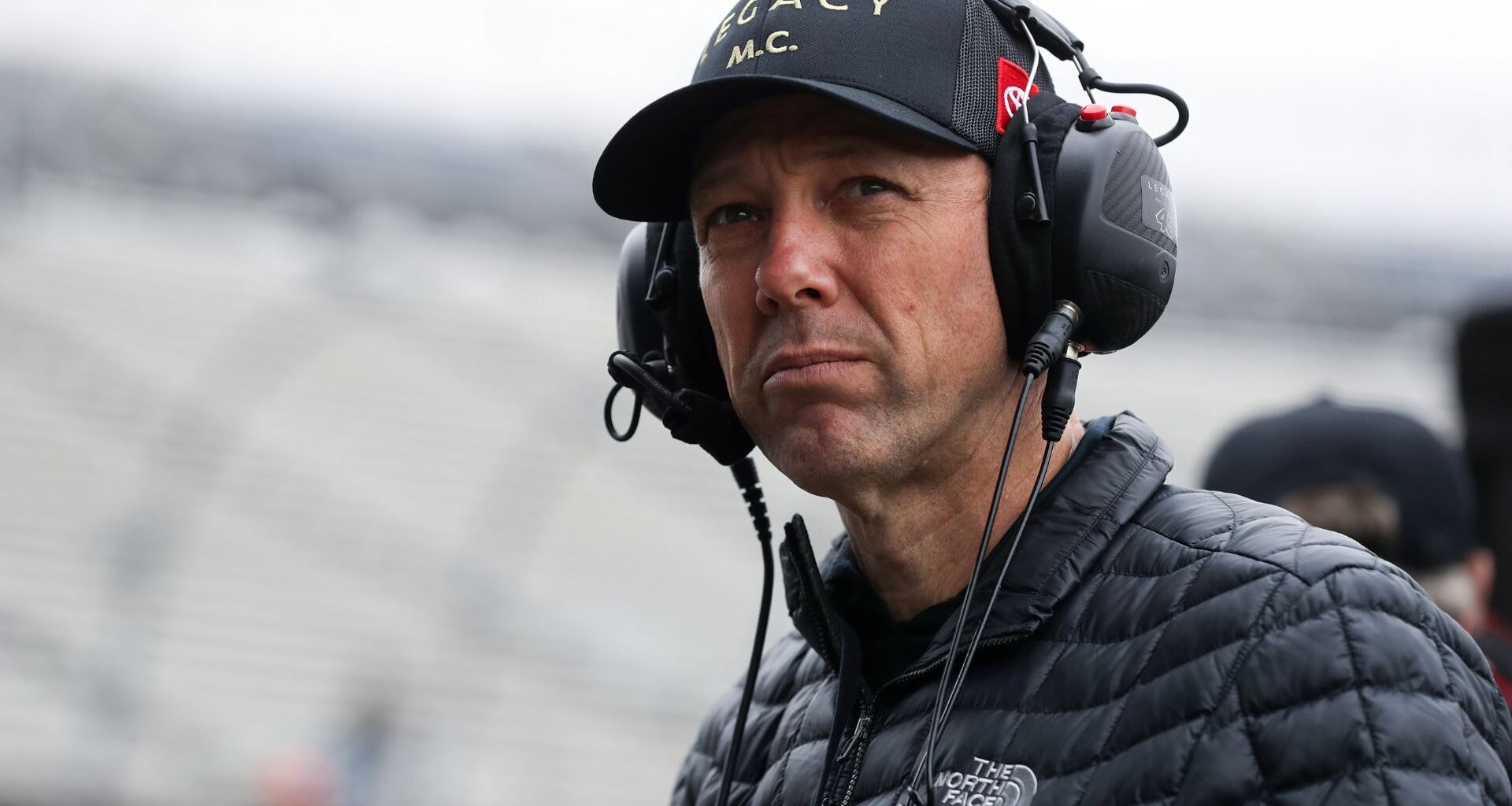 Apr 27, 2024; Dover, Delaware, USA; Former NASCAR Cup Series driver Matt Kenseth looks on during practice and qualifying for the Wurth 400 at Dover Motor Speedway.