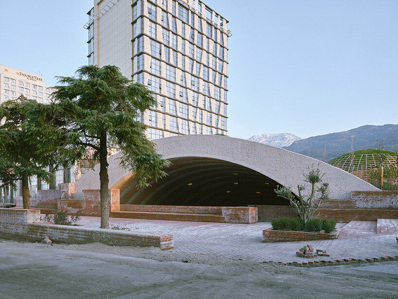 earth-covered domes and brick vaults shape liberation museum of manisa in turkey