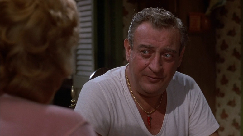 Monty (Rodney Dangerfield) looking at Rose (Candy Azzara) in Easy Money