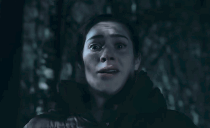 Victoria Sugden looks stunned in a darkened woodland in a scene from Corriedale.