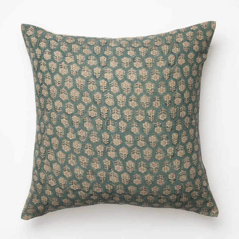 teal patterned cushion