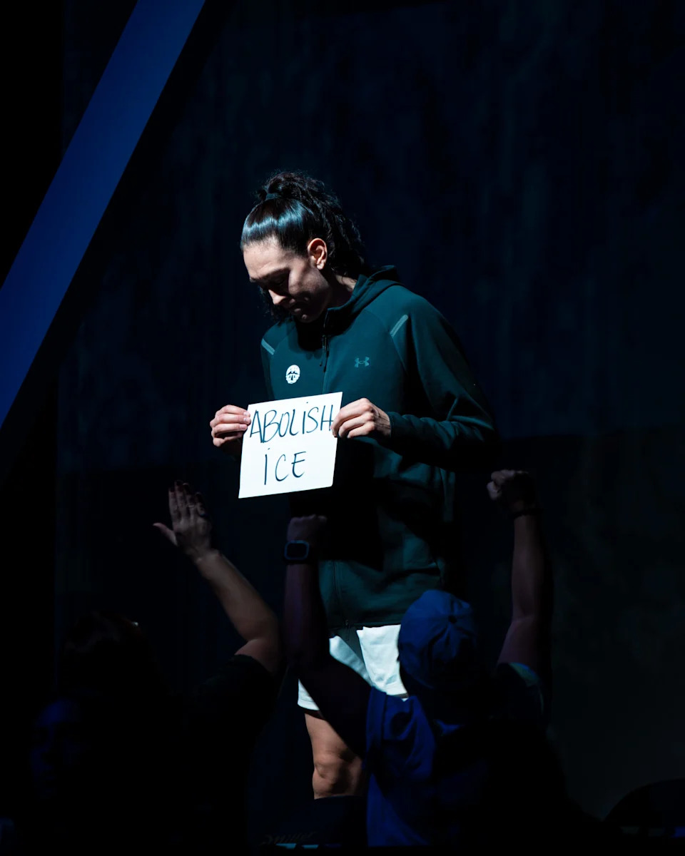 Breanna Stewart held up a sign sating "ABOLISH ICE" during player introductions at Unrivaled on Sunday, a day after a second U.S. citizen was fatally shot in Minneapolis.