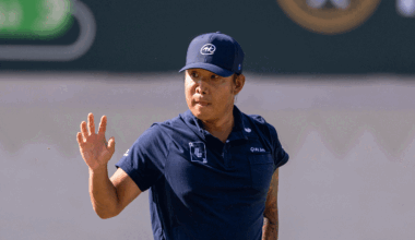 Anthony Kim waves to the crowd during the 2025 Saudi International