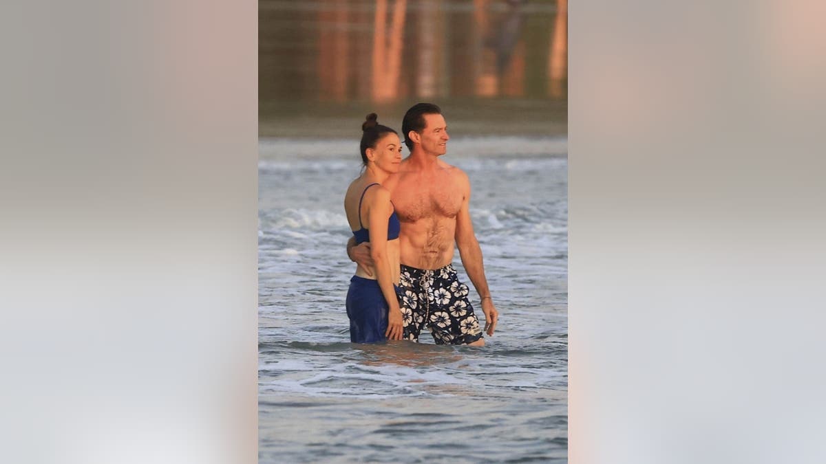 Sutton Foster and Hugh Jackman in the water 