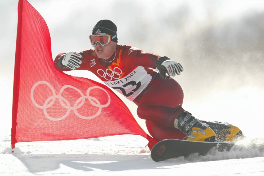 This February 2002 photo shows Ryan Wedding of Canada competing in the men's parallel giant slalom snowboarding event during the Salt Lake City Winter Olympic Games.