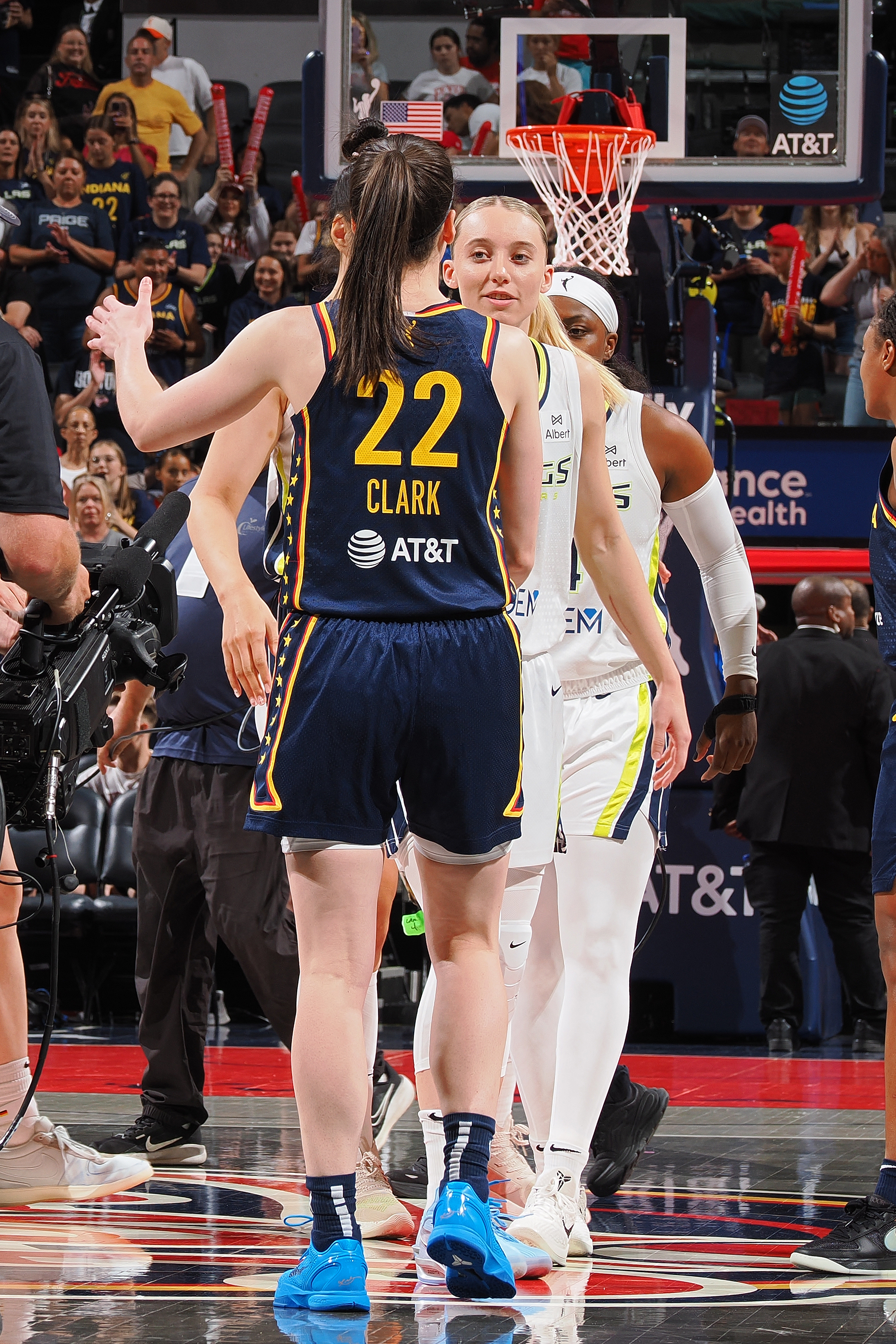 Caitlin Clark and Paige Bueckers.