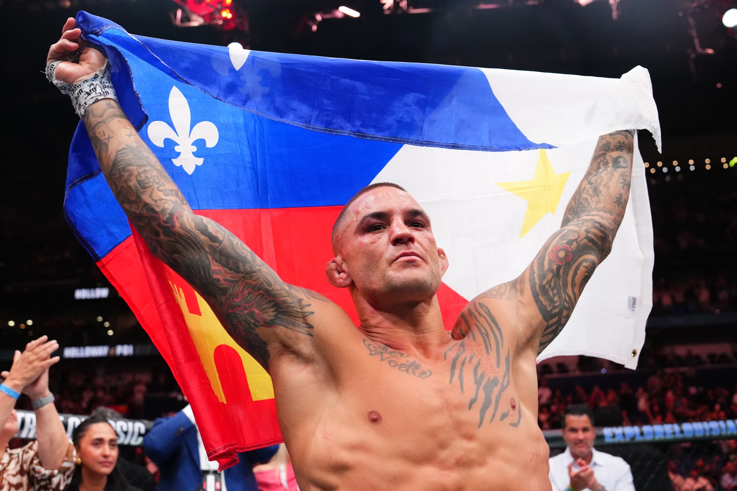 NEW ORLEANS, LOUISIANA - JULY 19: Dustin Poirier salutes the crowd after the BMF championship bout during the UFC 318 event at Smoothie King Center on July 19, 2025 in New Orleans, Louisiana. (Photo by Cooper Neill/Zuffa LLC)