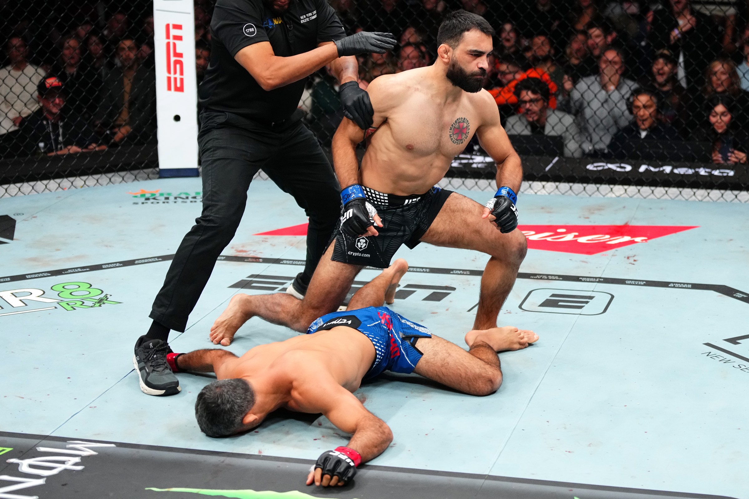NEW YORK, NEW YORK - NOVEMBER 15: (R-L) Benoit Saint Denis of France knocks out Beneil Dariush of Iran in a lightweight fight during the UFC 322 event at Madison Square Garden on November 15, 2025 in New York City. (Photo by Jeff Bottari/Zuffa LLC)