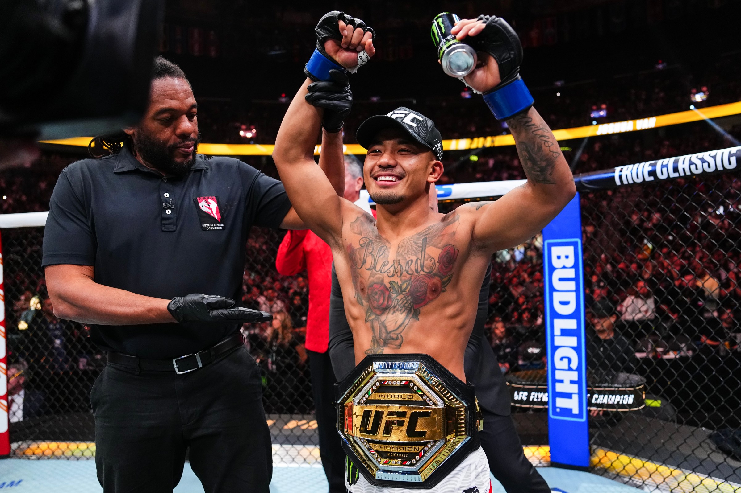 LAS VEGAS, NEVADA - DECEMBER 06:Joshua Van of Myanmar reacts to his TKO win in the UFC flyweight championship fight during the UFC 323 event at T-Mobile Arena on December 06, 2025 in Las Vegas, Nevada. (Photo by Jeff Bottari/Zuffa LLC)