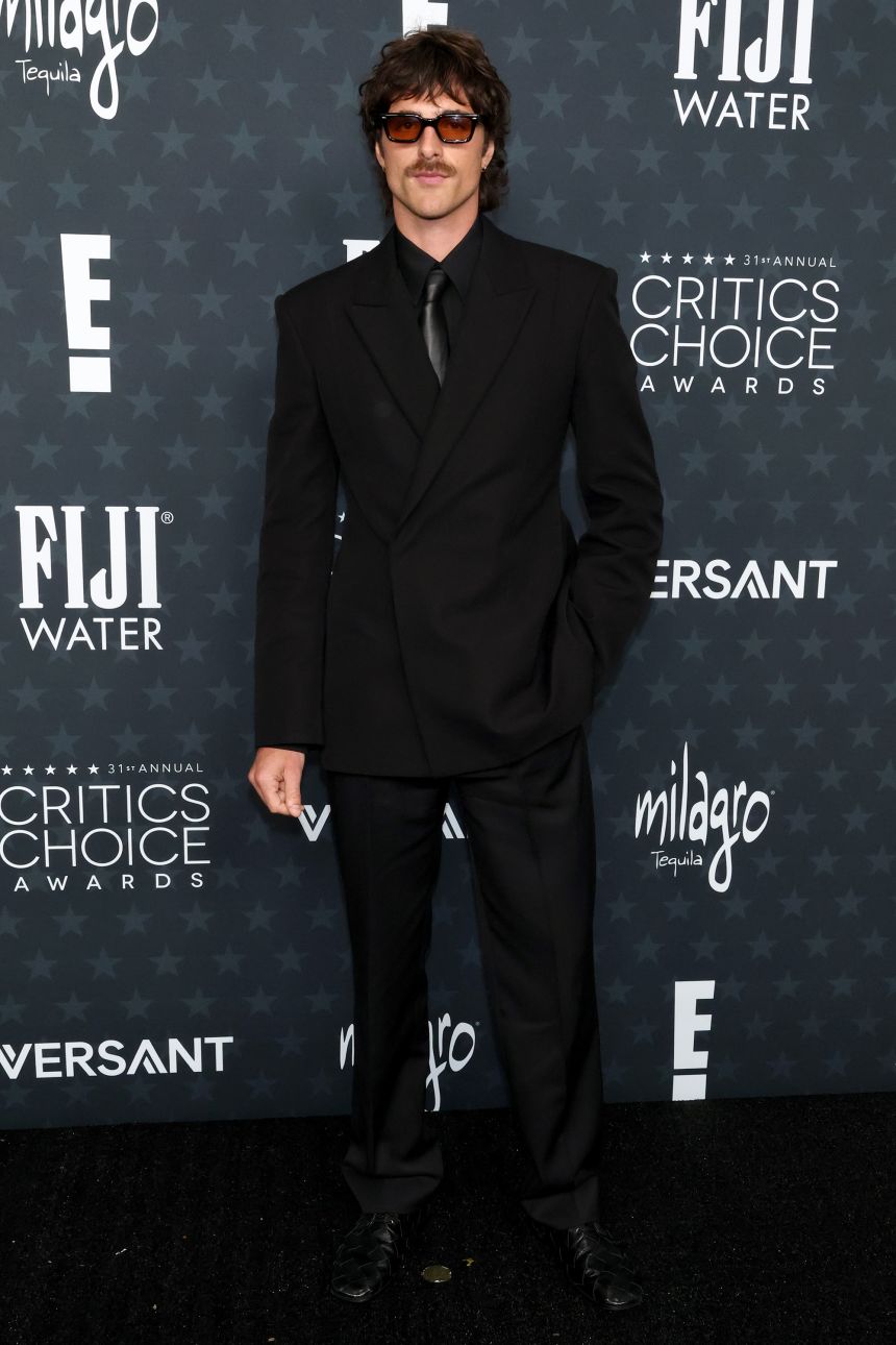 Jacob Elordi arrived in an all-black Bottega Veneta ensemble with shades.